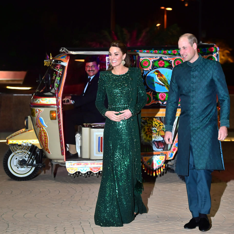 The Duke And Duchess Of Cambridge arrive in a rickshaw. [Photo: Getty] 