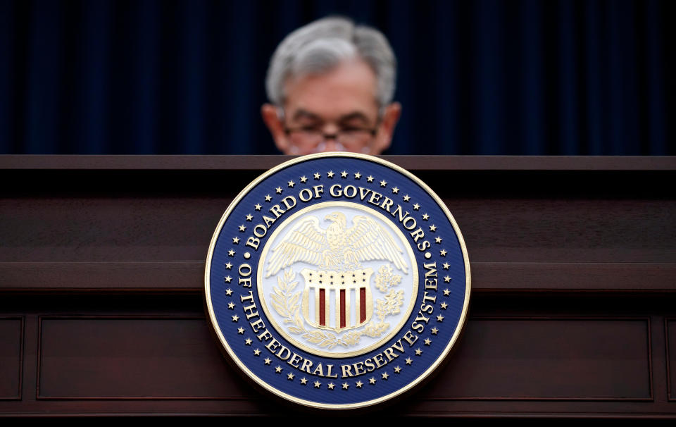 Federal Reserve Chairman Jerome Powell looks to his notes as he speaks during a news conference following the Federal Open Market Committee meeting in Washington. (AP Photo/Carolyn Kaster)