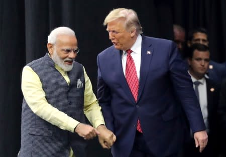 U.S. President Donald Trump and India's Prime Minister Narendra Modi participate in the "Howdy Modi" event in Houston