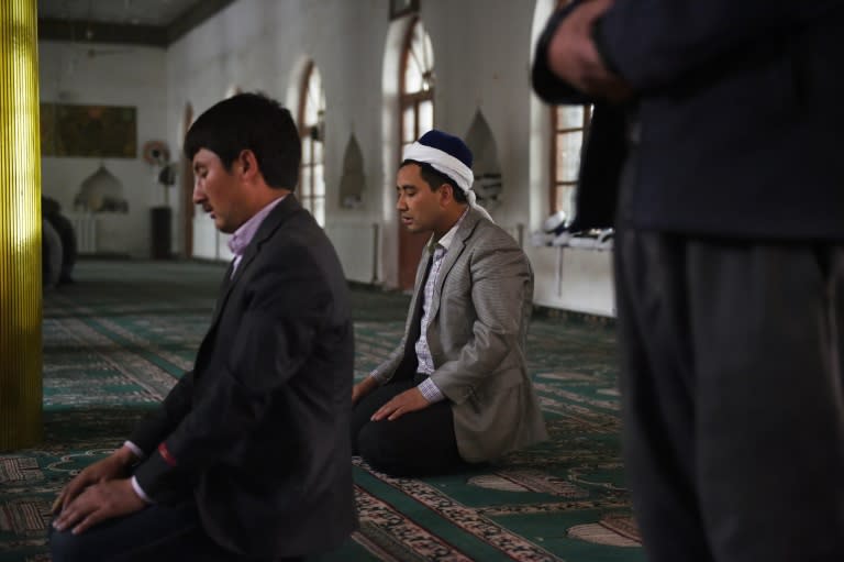 A Catholic NGO report on religious freedom says in China Uighur Muslims have been forbidden from observing Ramadan, Tibetan Buddhists face persecution and churches have been destroyed