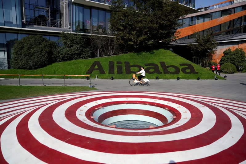 FILE PHOTO: A logo of Alibaba Group is seen during Alibaba Group's 11.11 Singles' Day global shopping festival at the company's headquarters in Hangzhou