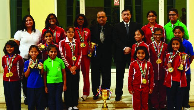  TMS swimmers show off their medals.