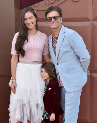 <p>Gregg DeGuire/WireImage</p> Caitlin McHugh Stamos, Billy Stamos, John Stamos