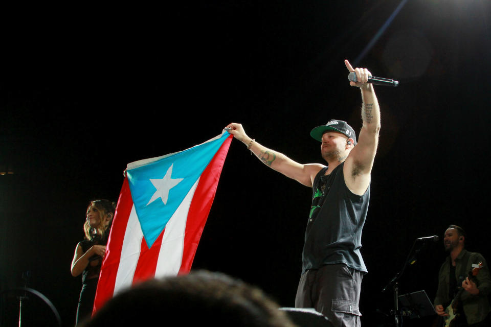 SAN JUAN, PUERTO RICO - FEBRUARY 02:  Kany Garcia perfoms with Rene Perez during her concert "Soy Yo" at Coliseo Jose M. Agrelot on February 2, 2019 in San Juan, Puerto Rico.  (Photo by Gladys Vega/Getty Images)