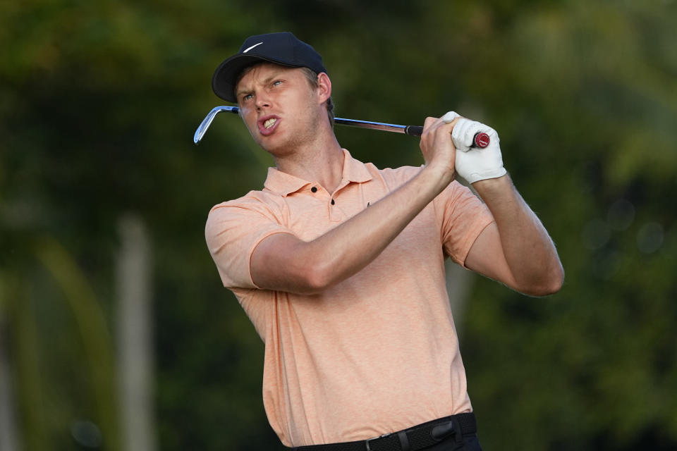 Cam Davis hits from the 11th tee during the second round of the Sony Open golf event, Friday, Jan. 12, 2024, at Waialae Country Club in Honolulu. (AP Photo/Matt York)