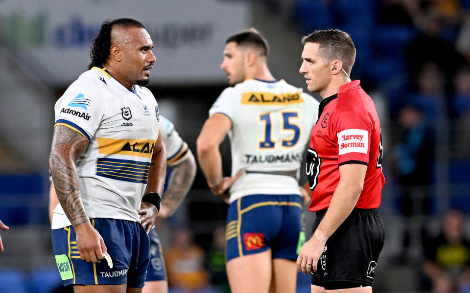 Pictured here, Parramatta's Junior Paulo is spoken to by the referee during the game against the Titans.