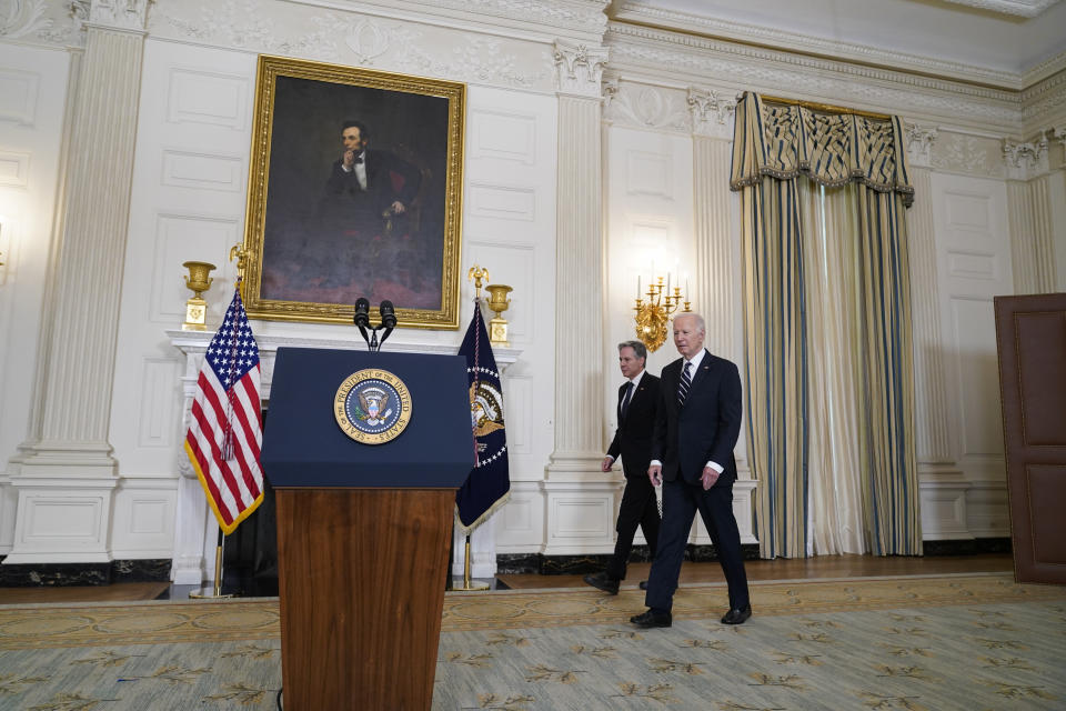 President Joe Biden arrives with Secretary of State Antony Blinken to speak in the State Dining Room of the White House, Saturday, Oct. 7, 2023, in Washington. (AP Photo/Manuel Balce Ceneta)
