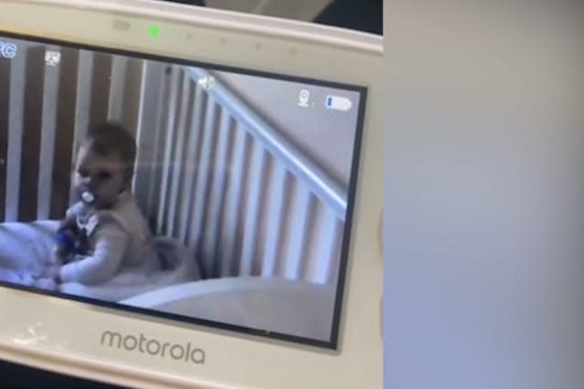 Hilarious footage shows the moment a crafty baby pretends to be asleep