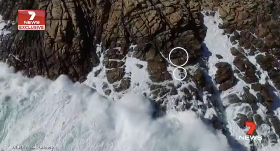 The massive swell has knocked three children off rocks in Western Australia’s south west. Source: 7 News/Blair Ranford