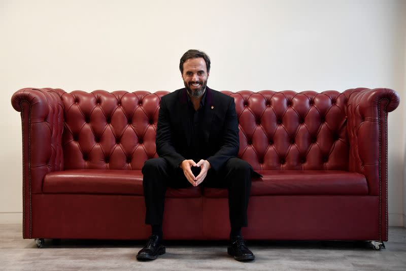 FILE PHOTO: Jose Naves CEO of online fashion house Farfetch poses for a portrait at the company headquarters in London