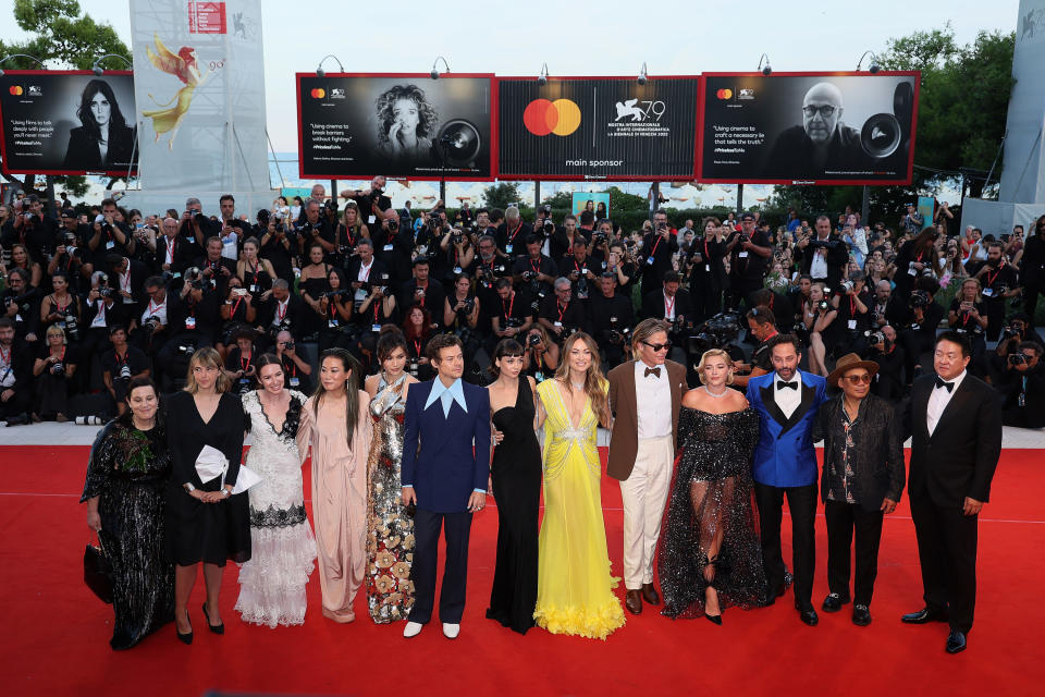 Gemma Chan, Harry Styles, Sydney Chandler, director Olivia Wilde, Chris Pine, Florence Pugh, Nick Kroll and six others attend the "Don't Worry Darling" red carpet at the 79th Venice International Film Festival.