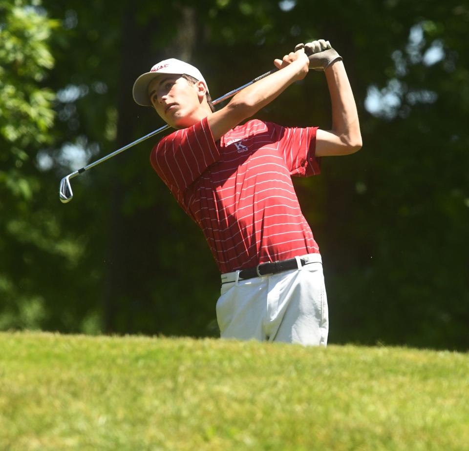 Killingly's Cam Seiffert watches his tee shot on the 14th hole during the CIAC Division II Golf Championship at Tallwood Country Club in Hebron. He shot a 77 and Killingly finished third.
(Photo: [John Shishmanian/ NorwichBulletin.com])