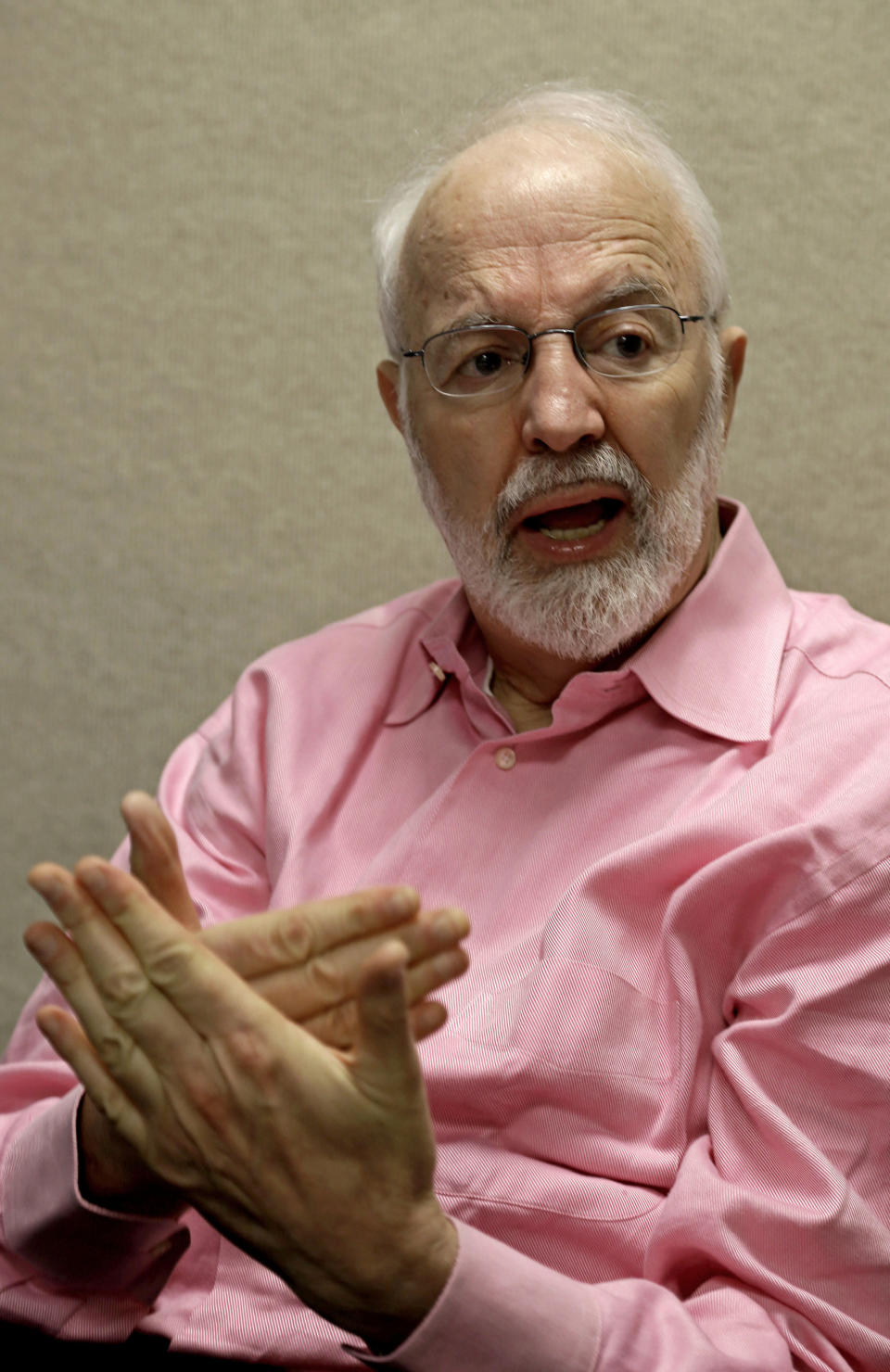 In this photo taken April 3, 2013, nutrition scholar Prof. Barry Popkin, head of the University of North Carolina Food Research Program, discusses his study, what foods Americans are purchasing in stores and eating, in his office at UNC-Chapel Hill. Popkin is leading a massive project of researchers who are creating a gargantuan map, something he calls "mapping the food genome." "We're interested in improving the public's health and it really takes this kind of knowledge," he says. (AP Photo/Gerry Broome)