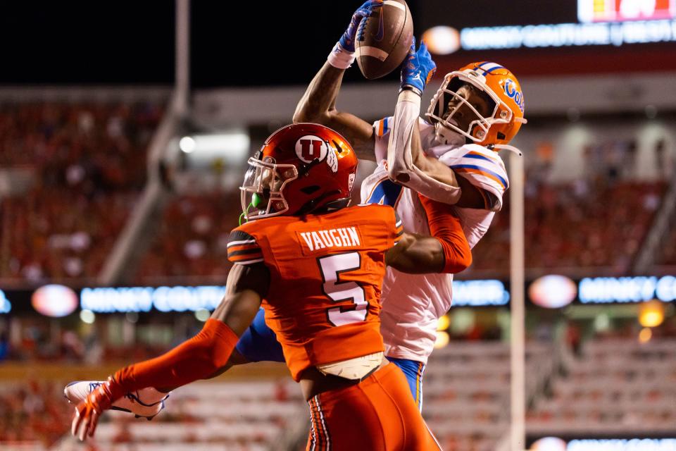 Utah Utes cornerback Zemaiah Vaughn (5) defends in the end zone as Florida Gators wide receiver Caleb Douglas (4) catches a touchdown pass during the season opener at Rice-Eccles Stadium in Salt Lake City on Thursday, Aug. 31, 2023. | Megan Nielsen, Deseret News