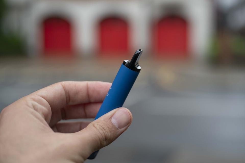  A man holds vape cigarette on his hand in London, England on August 08, 2023. (PHOTO: Rasid Necati Aslim/Anadolu Agency via Getty Images)