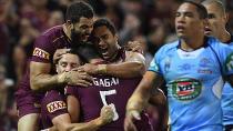 The Maroons celebrate Gagai's second try.