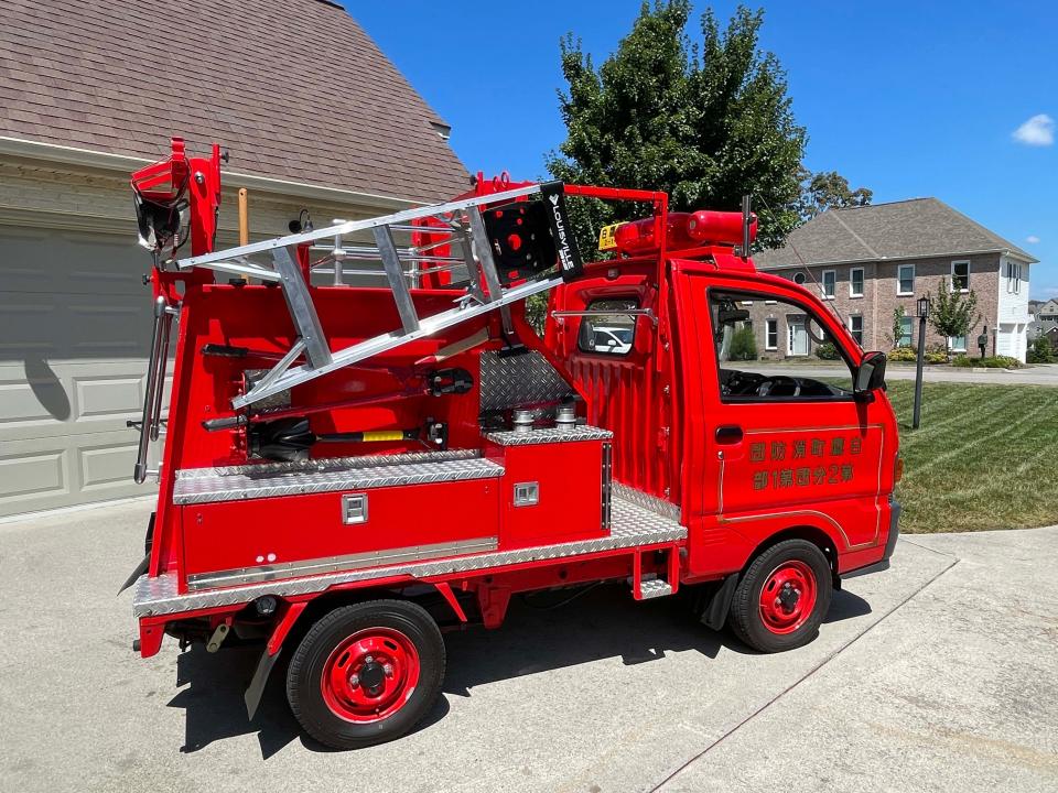 Joseph Smith outfitted his 1994 Mitsubishi fire truck with appropriate tools. It was designed to fit into the narrow streets in Japan.