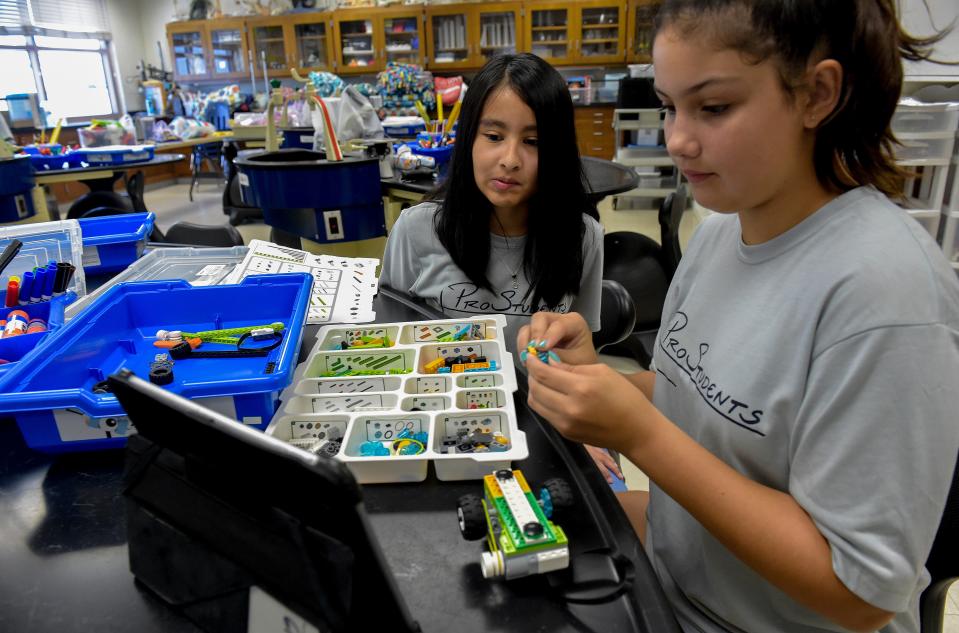 Students Jennifer Lopez, 11 (left), and Jaya Vernese, 10, construct a Lego rover from a kit during a Lego robotics summer class, learning about STEAM (science, art, technology, engineering, mathematics) on Tuesday, June 11, 2019, during the fifth ProStudents summer camp at St. Edward's School in Indian River County. "It's fun, I've never done this before, and I love playing with Legos and doing all this ... it's really fun for me," Jaya said.