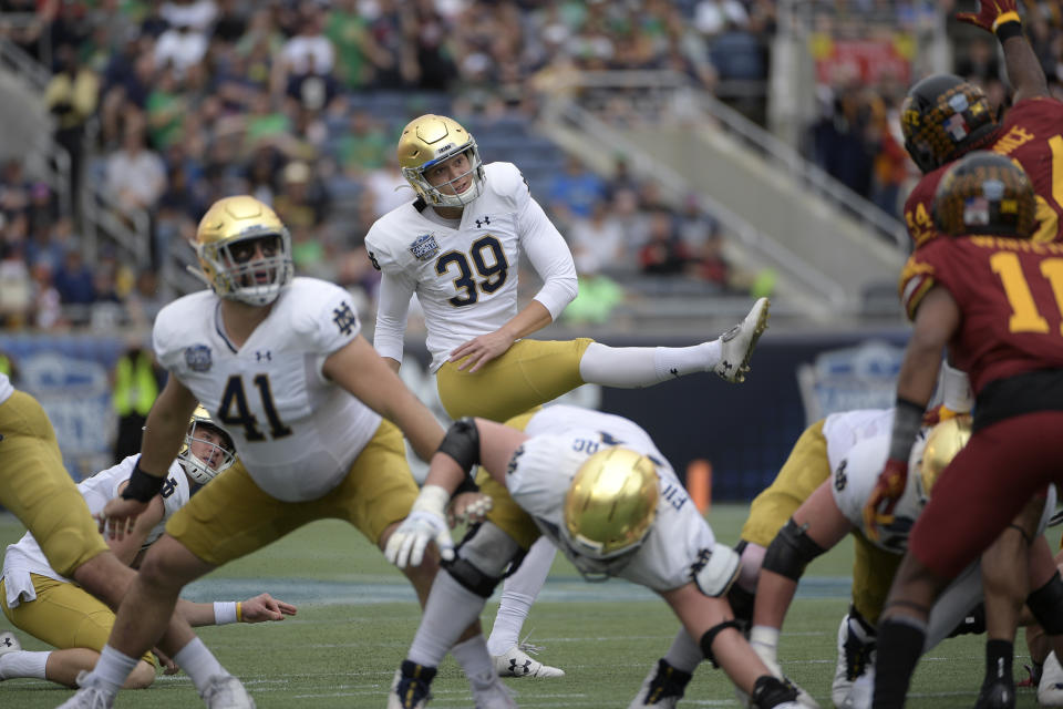 Notre Dame place kicker Jonathan Doerer (39) kicks a field goal during the first half of the Camping World Bowl NCAA college football game against Iowa State Saturday, Dec. 28, 2019, in Orlando, Fla. Doerer pays careful attention to the nuances of his stance, swing path and ball contact — and not just in football. Notre Dame’s senior kicker also frequents the driving range, a habit that only increased when he was home in Charlotte for the spring and summer. (AP Photo/Phelan M. Ebenhack)