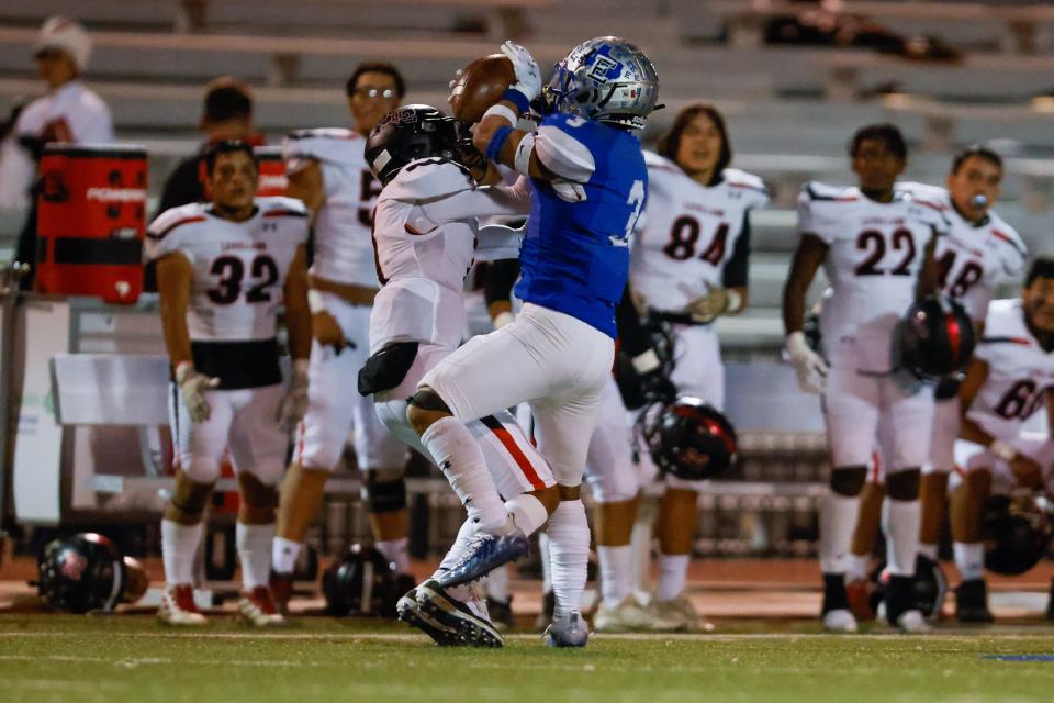 Estacado’s Raheim Ross (3) catches an interception during the team’s high school football game against Levelland Thursday, Oct. 28, 2021 at Lowrey Field at PlainsCapital Park in Lubbock, Texas.