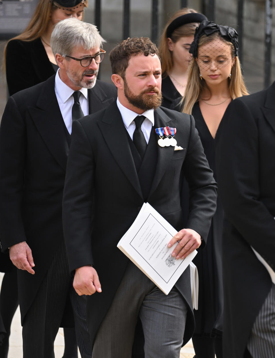 Timothy Taylor, Edward Windsor and Lady Amelia Windsor depart after attending the State Funeral of Queen Elizabeth II at Westminster Abbey on September 19, 2022