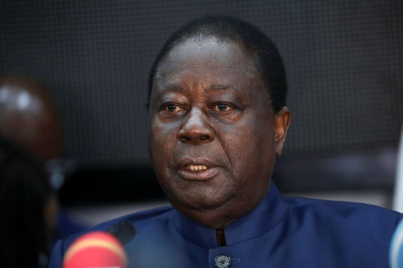 Former Ivory Coast President Henri Konan Bedie, candidate of the Democratic Party of Ivory Coast (PDCI) for the October 31 presidential election, speaks during a meeting with Ivory Coast opposition leaders in Abidjan