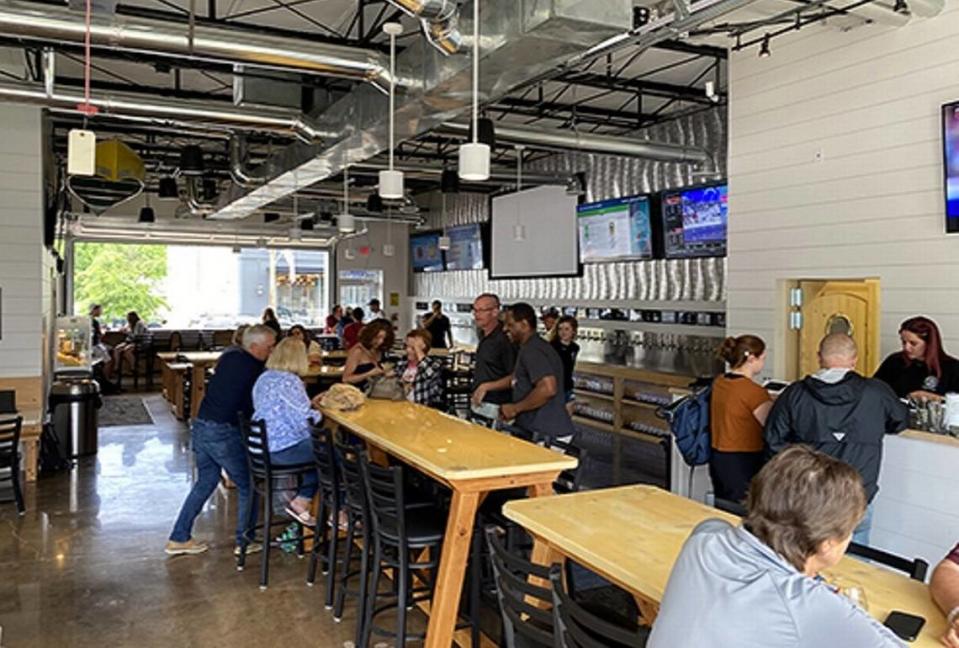 Hops & Berry Taproom is now open in Chatham Park’s Mosaic district off U.S. 15-501, north of Pittsboro. The business has 60 different taps and charges by the ounce for self-serve craft brews, wine, cocktails, seltzers and ciders.