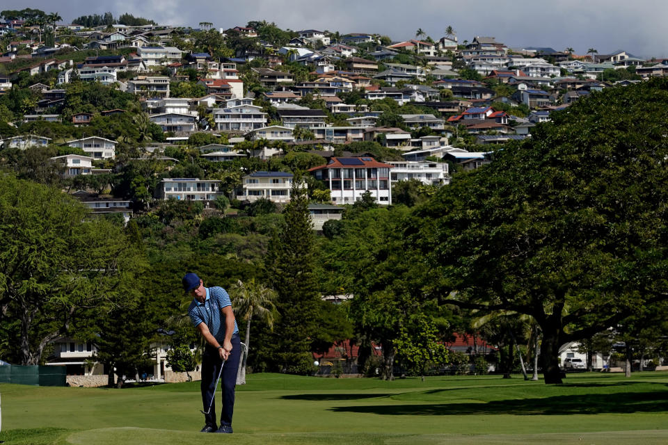 Brian Gay chips onto the 16th green during the first round of the Sony Open golf tournament, Thursday, Jan. 13, 2022, at Waialae Country Club in Honolulu. (AP Photo/Matt York)