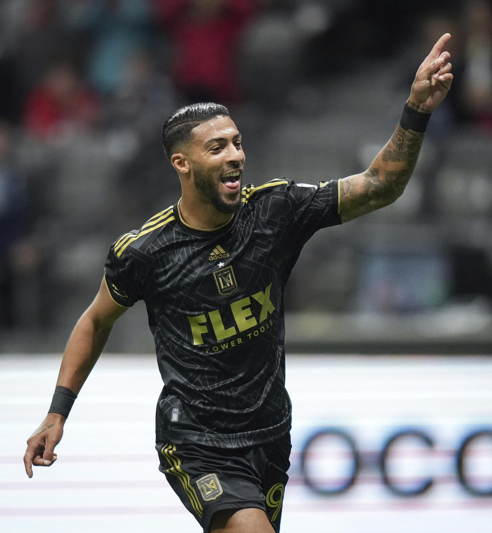 Los Angeles FC's Denis Bouanga celebrates after his goal against the Vancouver Whitecaps during the first half of an MLS soccer match in Vancouver, British Columbia, Saturday, Oct. 21, 2023. (Darryl Dyck/The Canadian Press via AP)