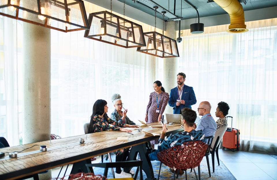 a group of people at a table together