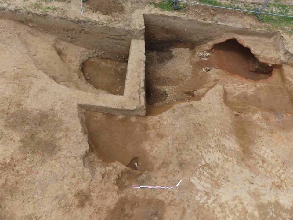 The oven was connected to a pit, archaeologists said. Photo by Alais Tayac from INRAP