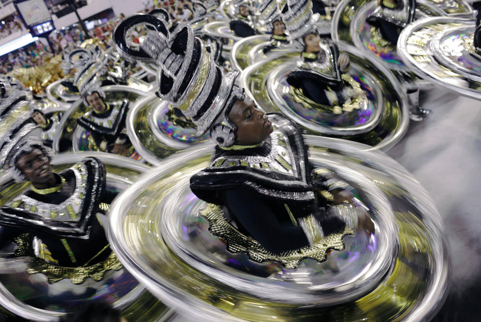 <p>Revellers from Vila Isabel Samba school perform during the first night of the Carnival parade at the Sambadrome in Rio de Janeiro, Brazil, Feb.11, 2018. (Photo: Ricardo Moraes/Reuters) </p>