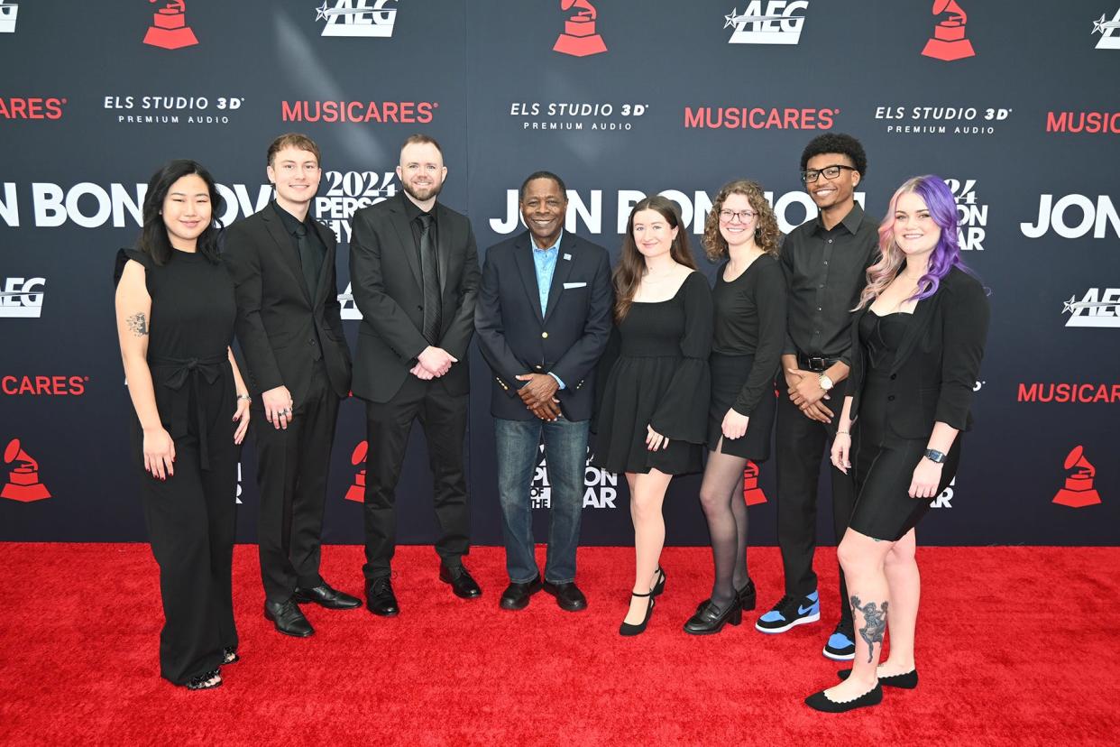 Middle Tennessee State University President Sidney A. McPhee, center, is joined by several students from the MTSU College of Media and Entertainment on the red carpet Friday, Feb. 2, in Los Angeles as the students worked the Recording Academy’s pre-Grammys black-tie charitable fundraising event honoring legendary rocker Jon Bon Jovi as MusiCares’ Person of the Year. For the ninth year, the university sent a delegation of students, faculty and administrators to Grammys to honor alumni nominees and network with industry professionals.