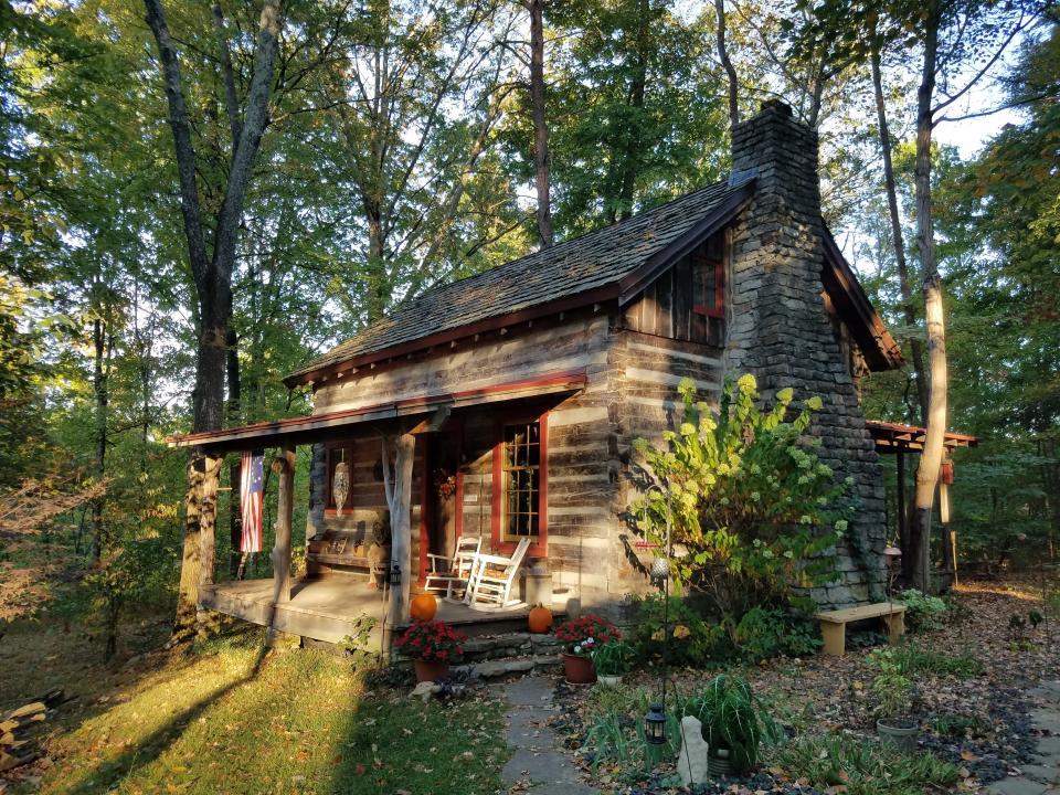 Enjoy your own log cabin on a wooded hillside overlooking a lake as you start on the bourbon trail.