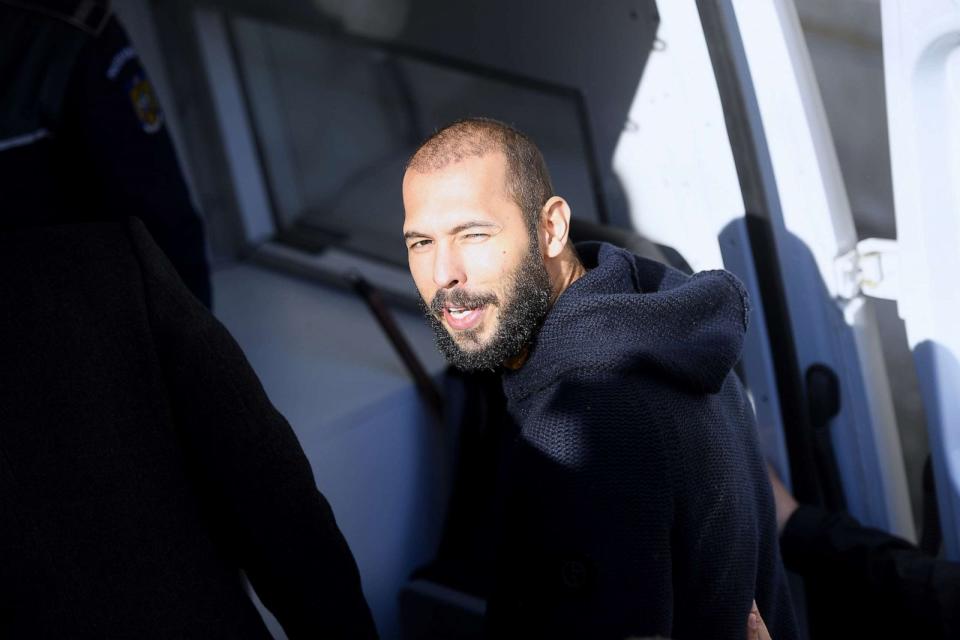 PHOTO: Andrew Tate leaves court after his trial in Bucharest, Romania on February 1, 2023. (Anadolu Agency via Getty Images)