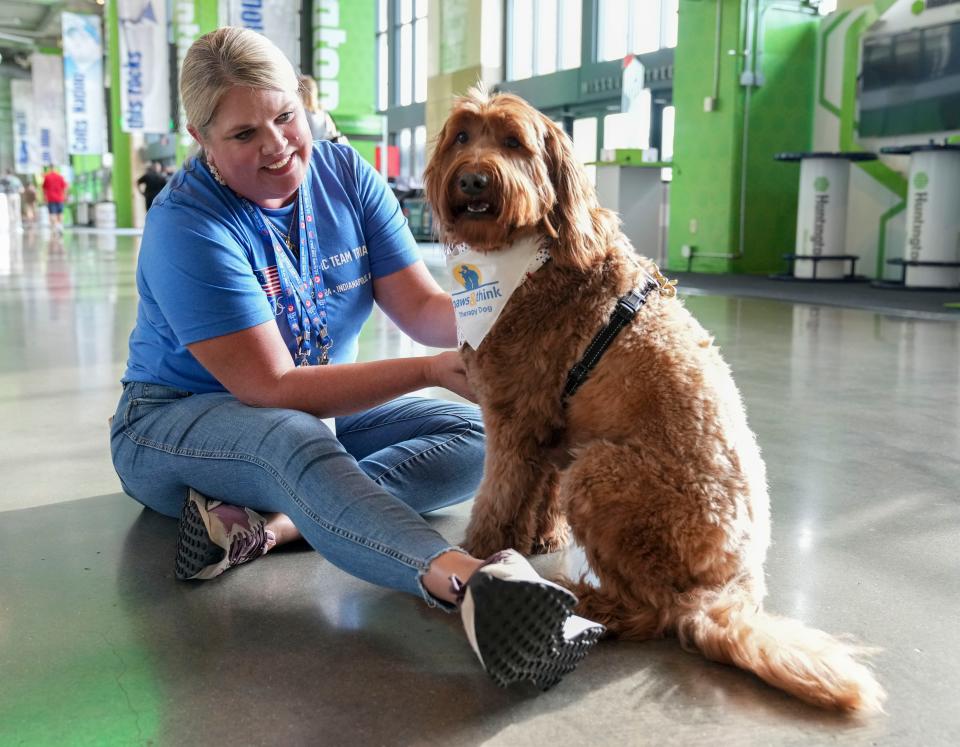 Renee Jent and her dog, Sterling, on Tuesday, June 18, 2024, at Lucas Oil Stadium in Indianapolis.