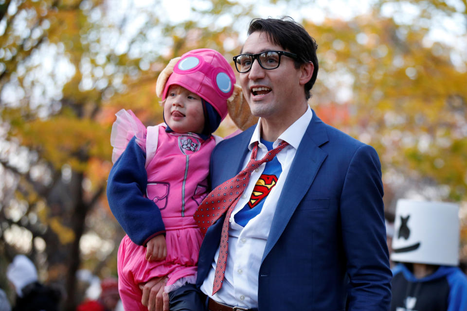 Justin Trudeau carries his son Hadrien while participating in Halloween festivities at Rideau Hall in Ottawa, Ontario, Canada on Oct. 31. (Photo: Chris Wattie / Reuters)