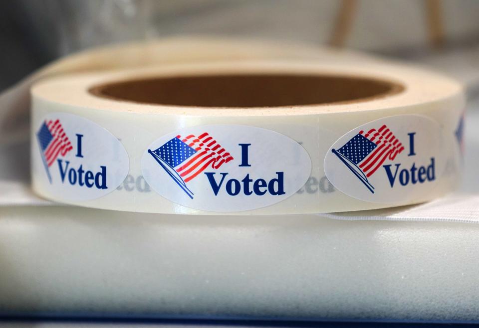 With coronavirus safety precautions in place, the "I Voted" stickers were self-serve only this year at the Portsmouth polls.