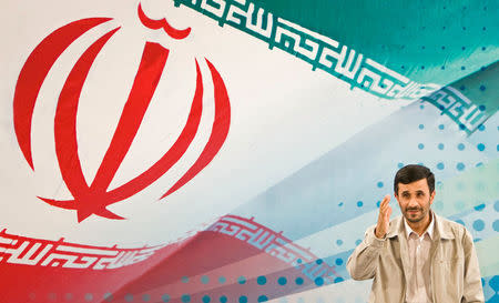 FILE PHOTO: Iran's President Mahmoud Ahmadinejad greets journalists before the start of a news conference in Tehran September 18, 2008.REUTERS/Raheb Homavandi/File Photo