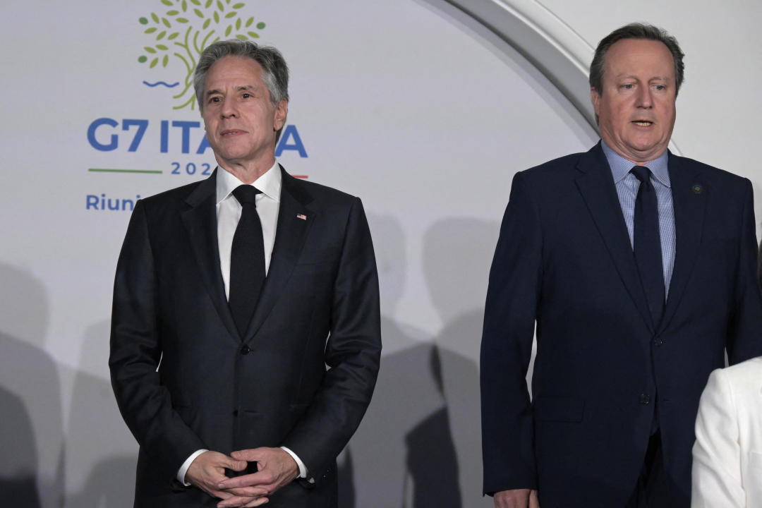 U.S. Secretary of State Antony Blinken (L) and Britain's Foreign Secretary David Cameron arrive for a family photo during the G7 foreign ministers meeting on the small island of Capri on April 18, 2024. (Photo by Tiziana FABI / AFP) (Photo by TIZIANA FABI/AFP via Getty Images)