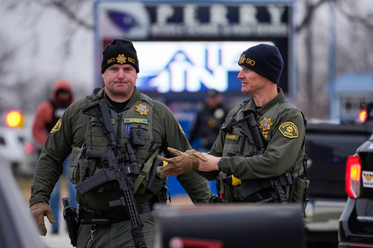 Police respond to Perry High School in Perry, Iowa., Thursday, Jan. 4, 2024. Police say there has been a shooting at the city's high school.(AP Photo/Andrew Harnik)