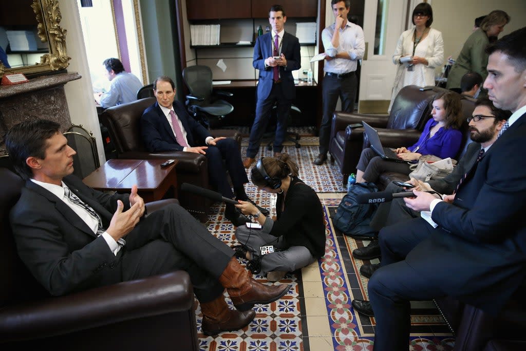 Sens Ron Wyden and Martin Heinrich are both on the Senate’s Intelligence Committee (Getty Images)