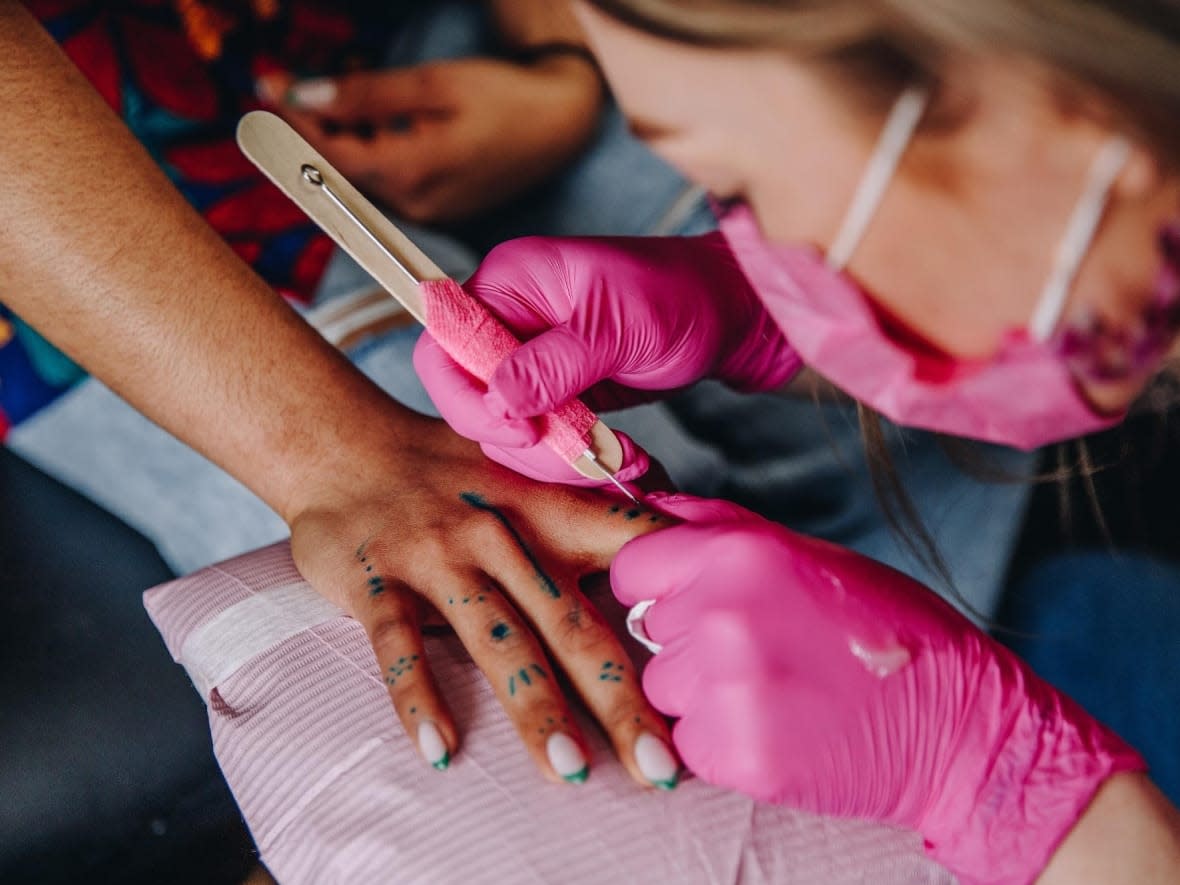 Stick-and-poke tattooing is derived from traditional forms which go back thousands of years. (Via Reyes - image credit)