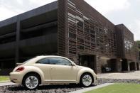 A Volkswagen Beetle car is displayed during a ceremony marking the end of production of VW Beetle cars, at company's assembly plant in Puebla