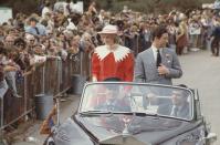 <p>The Prince and Princess of Wales greet onlookers as they head to the Memorial Oval in Port Pirie, Australia.</p>