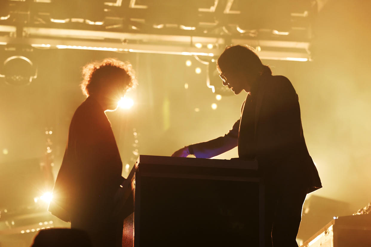 Gaspard Augé and Xavier de Rosnay of Justice perform at the Coachella music festival.