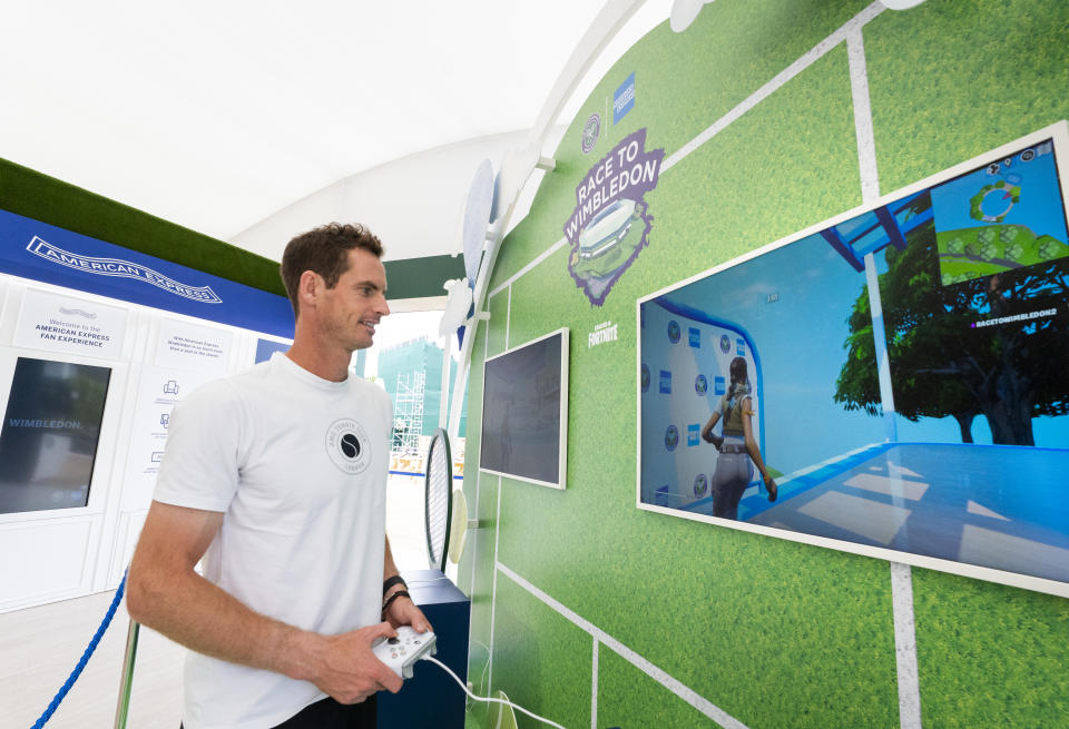 Andy Murray poses in the American Express Fan Experience zone whilst playing Fortnite: Race to Wimbledon at All England Lawn Tennis & Croquet Club, Wimbledon. Picture date: Monday June 26, 2023. PA Photo. See PA story TENNIS Murray. Photo credit should read: Zac Goodwin/PA Wire.

RESTRICTIONS: Use subject to restrictions. Editorial use only, no commercial use without prior consent from rights holder.