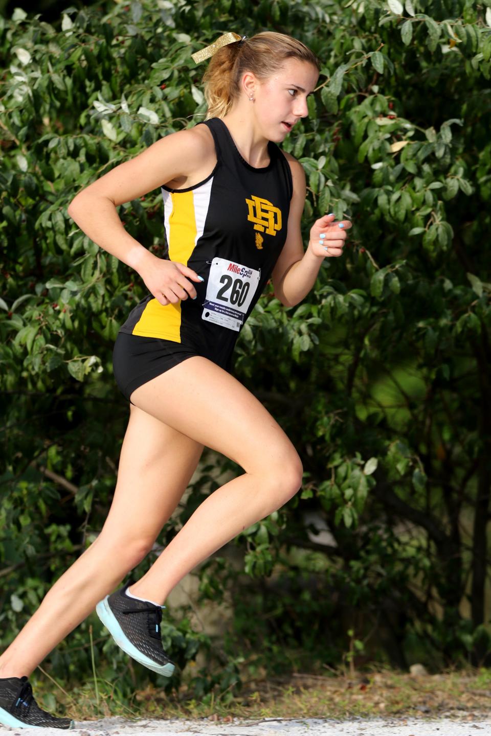 Christina Allen, of River Dell, is shown on her way to a first place finish with a time of 20:03 at the Big North - Patriot Batch Meet, at Darlington County Park, in Mahwah.  Monday September 27, 2021