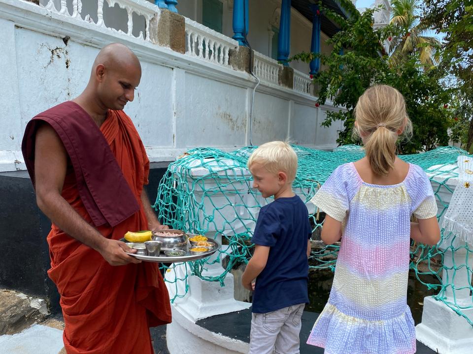 Karen Edwards' children with a monk.