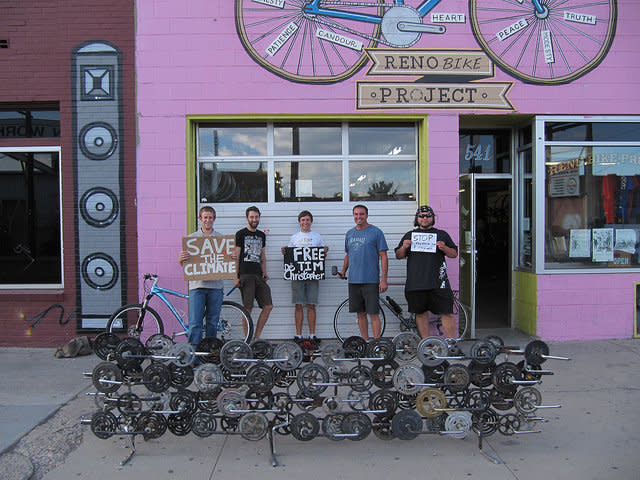 "Free Tim deChristopher," reads a sign outside the Reno Bike Project in Reno, Utah. De Christopher was arrested on July 26 and sentenced to a two-year prison term for his act of civil disobedience to halt the sale of US lands for fossil fuel development. 